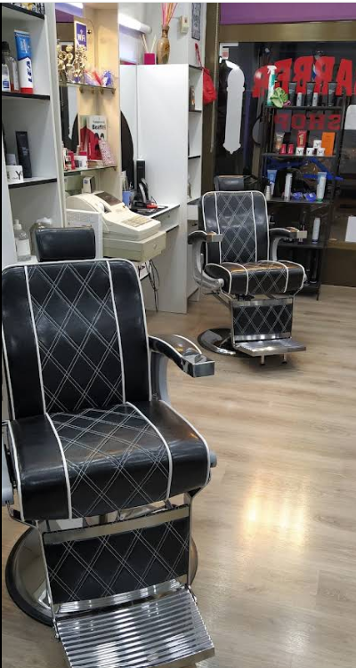 Sillones e interior de Barbería Molina